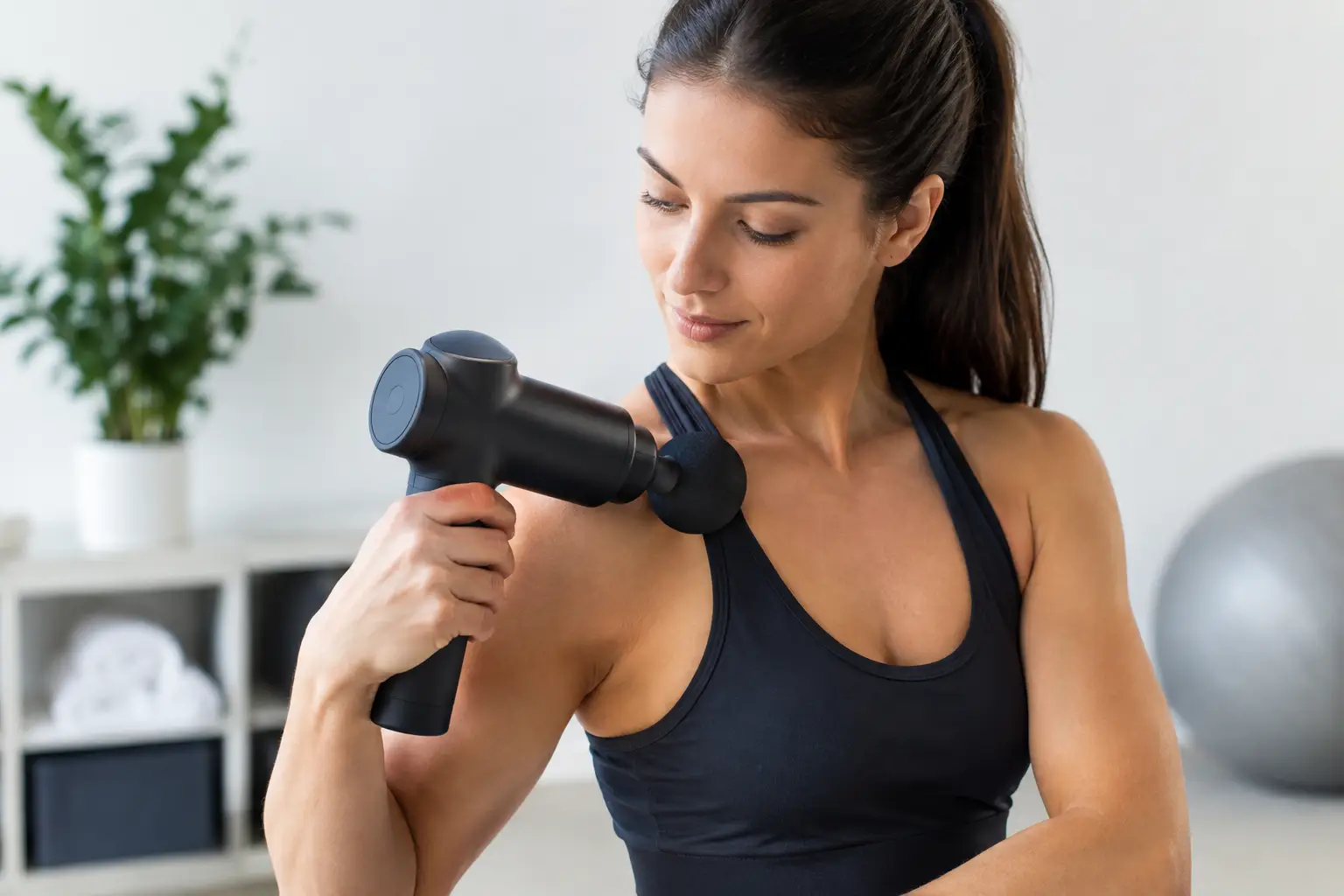 Cómo usar una pistola de masaje muscular
